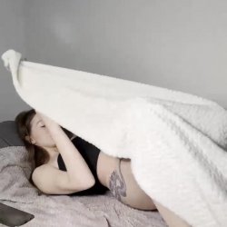 Tattooed ass lifts high under soft towel 😘