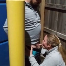 University of Kentucky staff have a quick sneaky link backstage at a football game