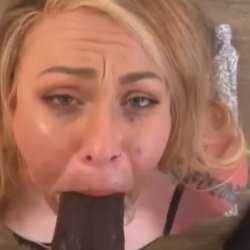 White MILF  gives her bbc bull some good head.