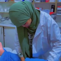 Arab nurse doin surgery on a patient dick