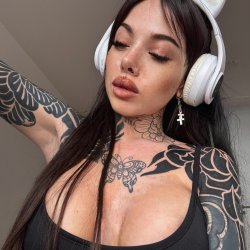 Tattooed girl has a secret