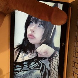 Cute goth girl staring at a big cock