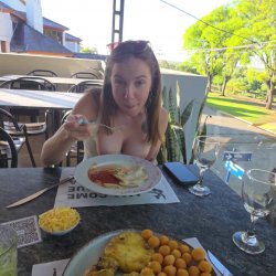 Having lunch in Argentina and flashing my boobs in public
