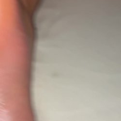 GF soles on the bed oiled up