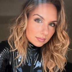 Sexy babe in vinyl catsuit