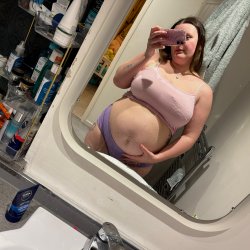 This pregnant slut can make your dick hard all day long.