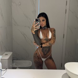 A hot girl enjoying her curves and showing them off