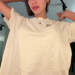 Gorgeous long-haired barely wearing anything, looking right at you. OnlyFans has the rest