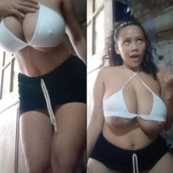 Curvy girl with big tits bouncing her boobs