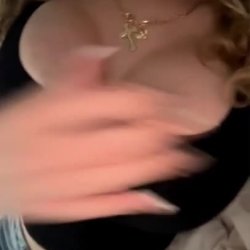 gorgeous teen teasing her big tits