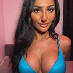 Care to stop and cum on my tits?