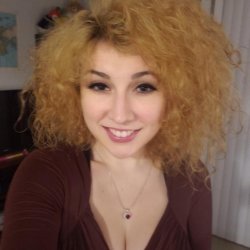 Curly Hair Slut with Great Cleavage 22
