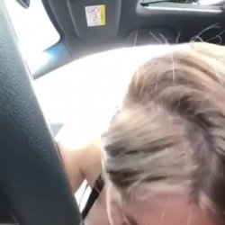 cheating on her boyfriend with a stranger in a car giving him a blowjob