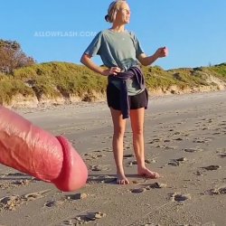 Naked at the beach and having a friendly conversation with a swimmer