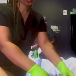 Two ebony beautician preparing the dick waxing