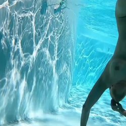 swims naked in the pool...